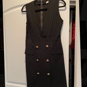 Black dress. Size 6. Never worn! Black with beautiful gold buttons.